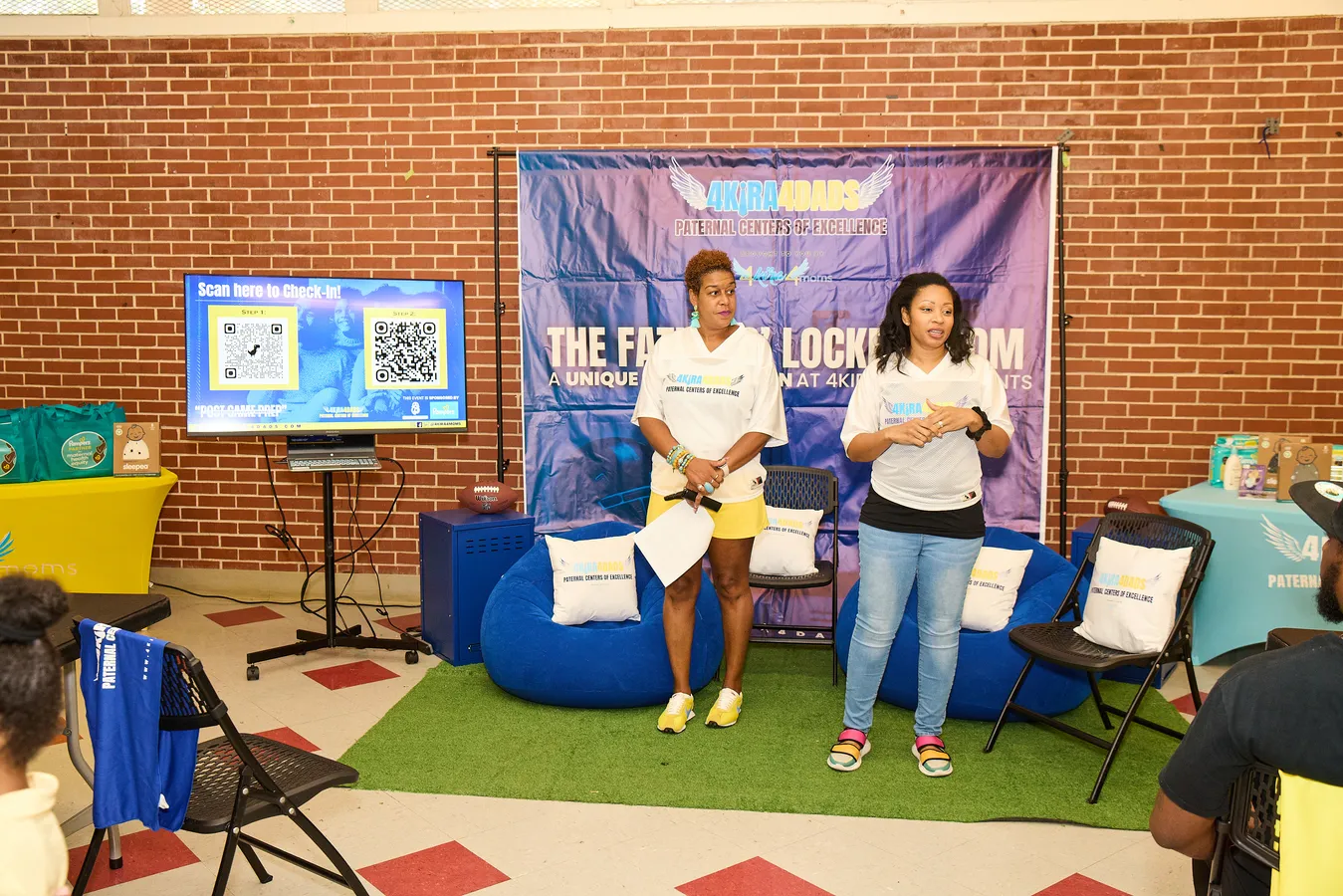 Presenters speaking at the 4Kira4Dads Fathers’ Locker Room event.